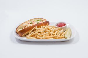 lobster roll served at a restaurant in boston, ma