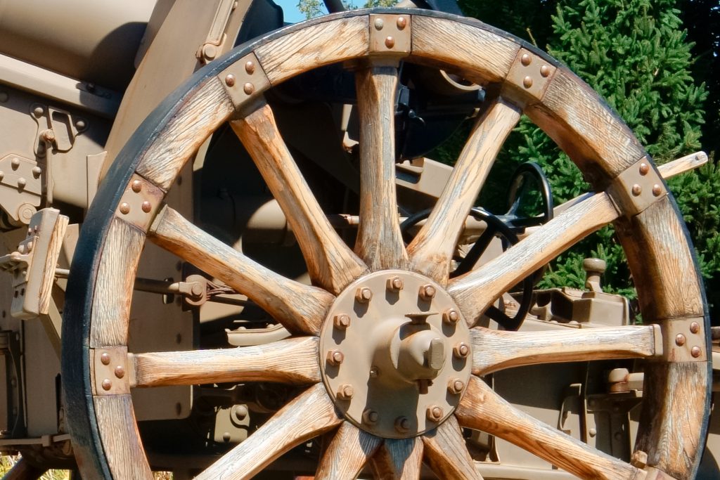 Close up view of wooden wheel of historical cannon Norwood MA USA. - Jack Madden Ford